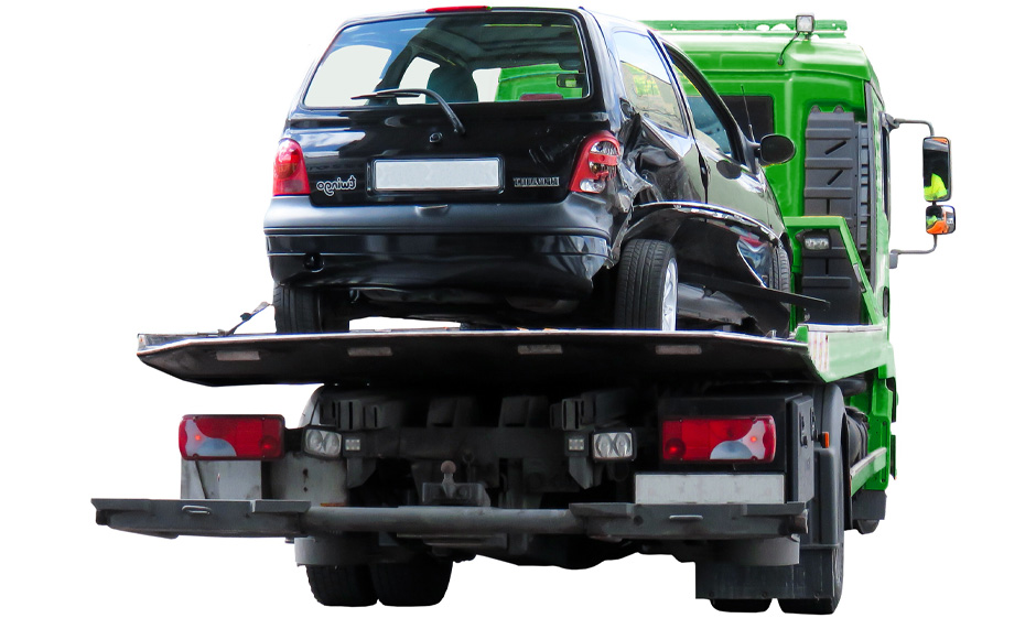 Green Flatbed Towing Truck with damaged black car on it.